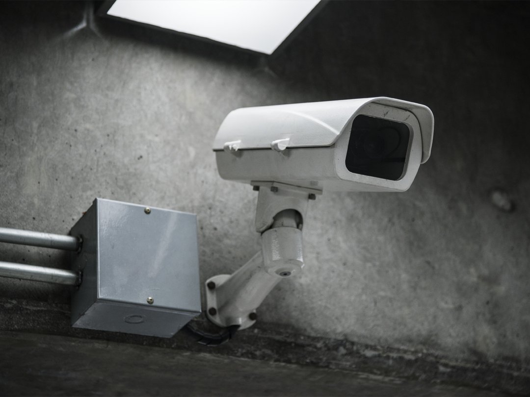 closeup-cctv-camera-wall